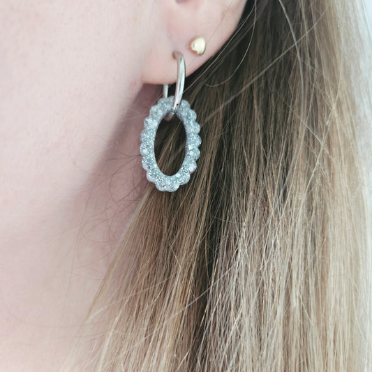 Boucles d'oreilles créoles argentées Lumina Argent avec pendentif ovale scintillant
