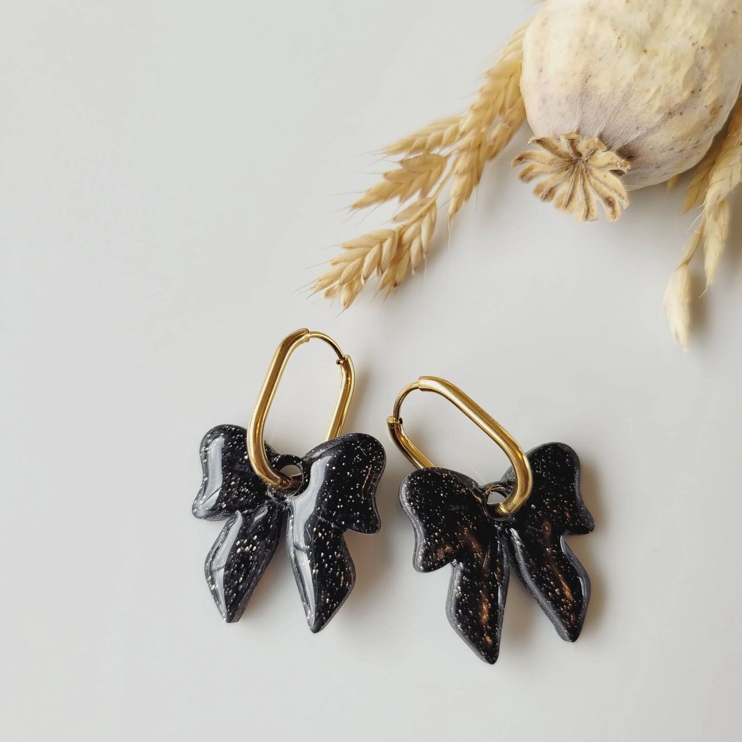 Boucles argile polymère | Nœud Noir