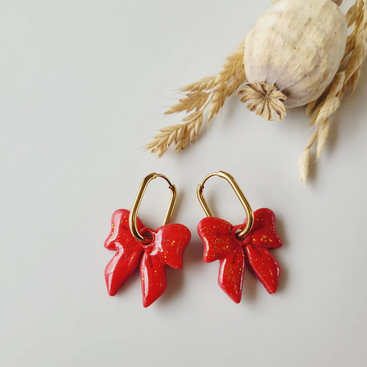 Boucles argile polymère | Nœud Rouge